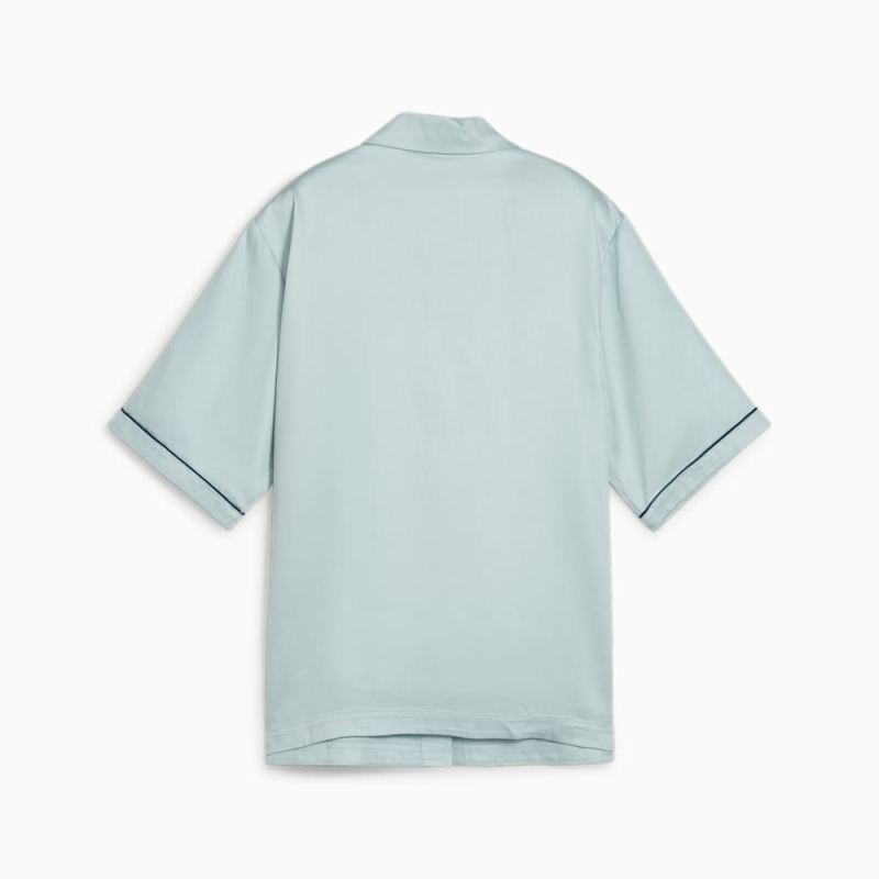 Puma | Women's INFUSE Woven Shirt - Turquoise Surf